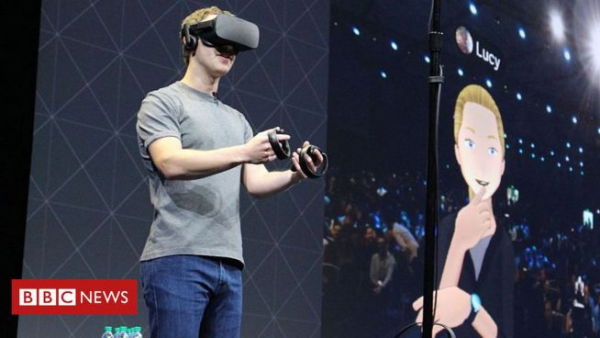 페이스북 설립자이자 CEO인 마크 주커버그가 자회사 오큘러스의 VR 기기를 시연하는 모습. ⓒBBC 캡처